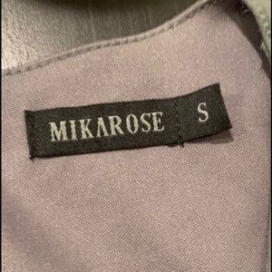 just wrinkled, needs to be ironed or steamed.